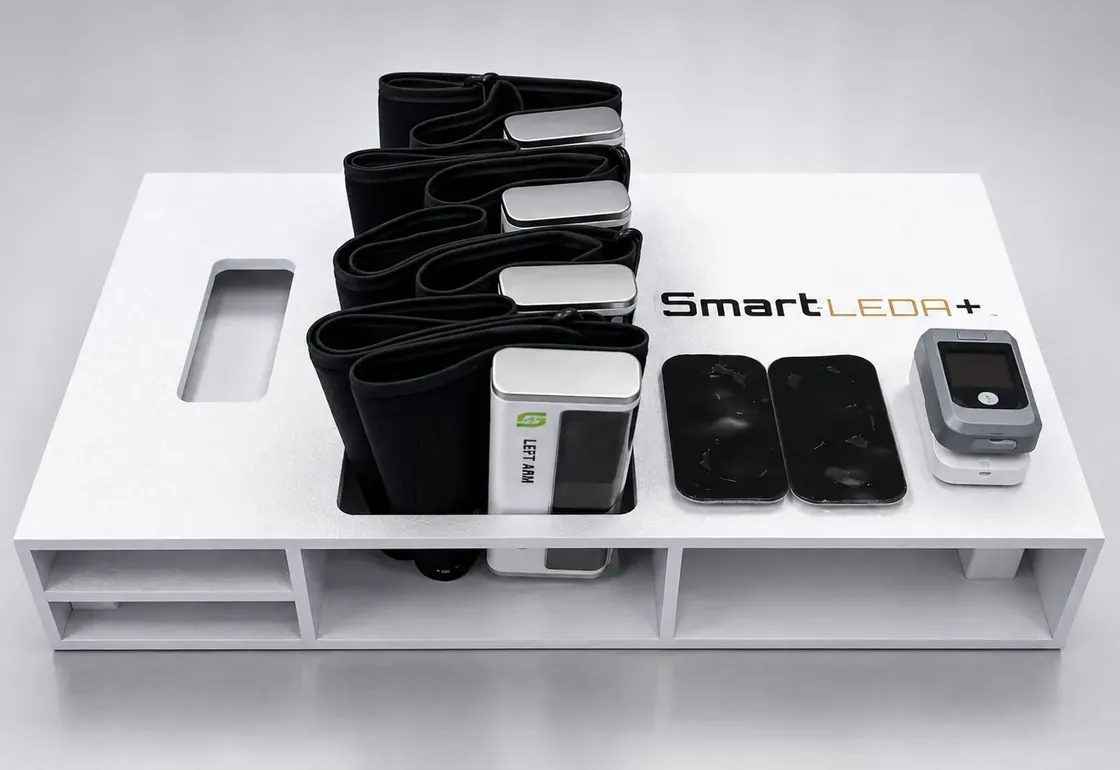 Smart-LEDA+ ABI, TBI and sudomotor testing kit in its white case, holding the wireless cuffs, electrode pads and a pulse oximeter