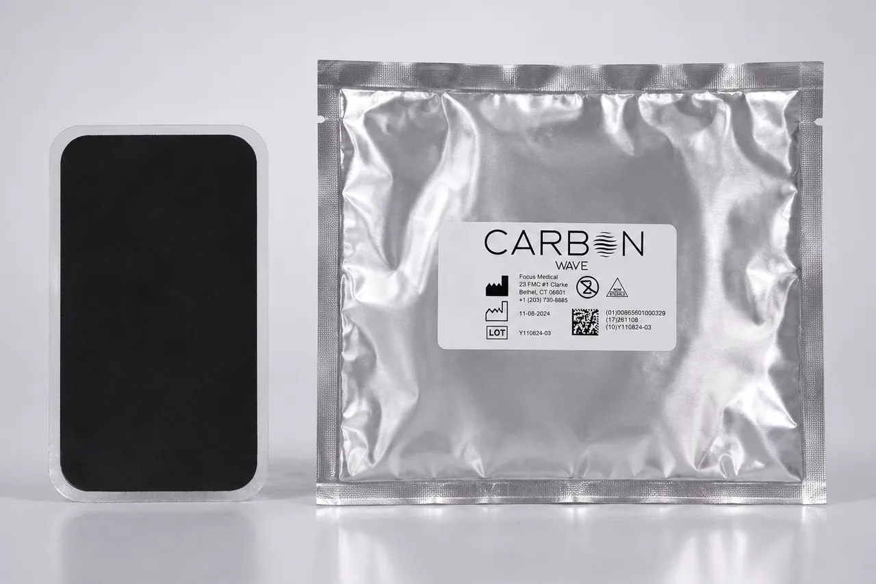 A Carbon Wave patch beside its sealed foil pack