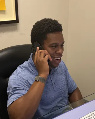 A Hyperion Medical team member on the phone with a customer
