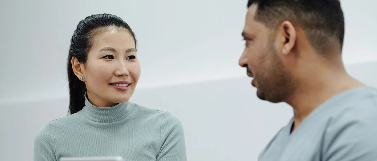 Clinician and patient in conversation during a consultation
